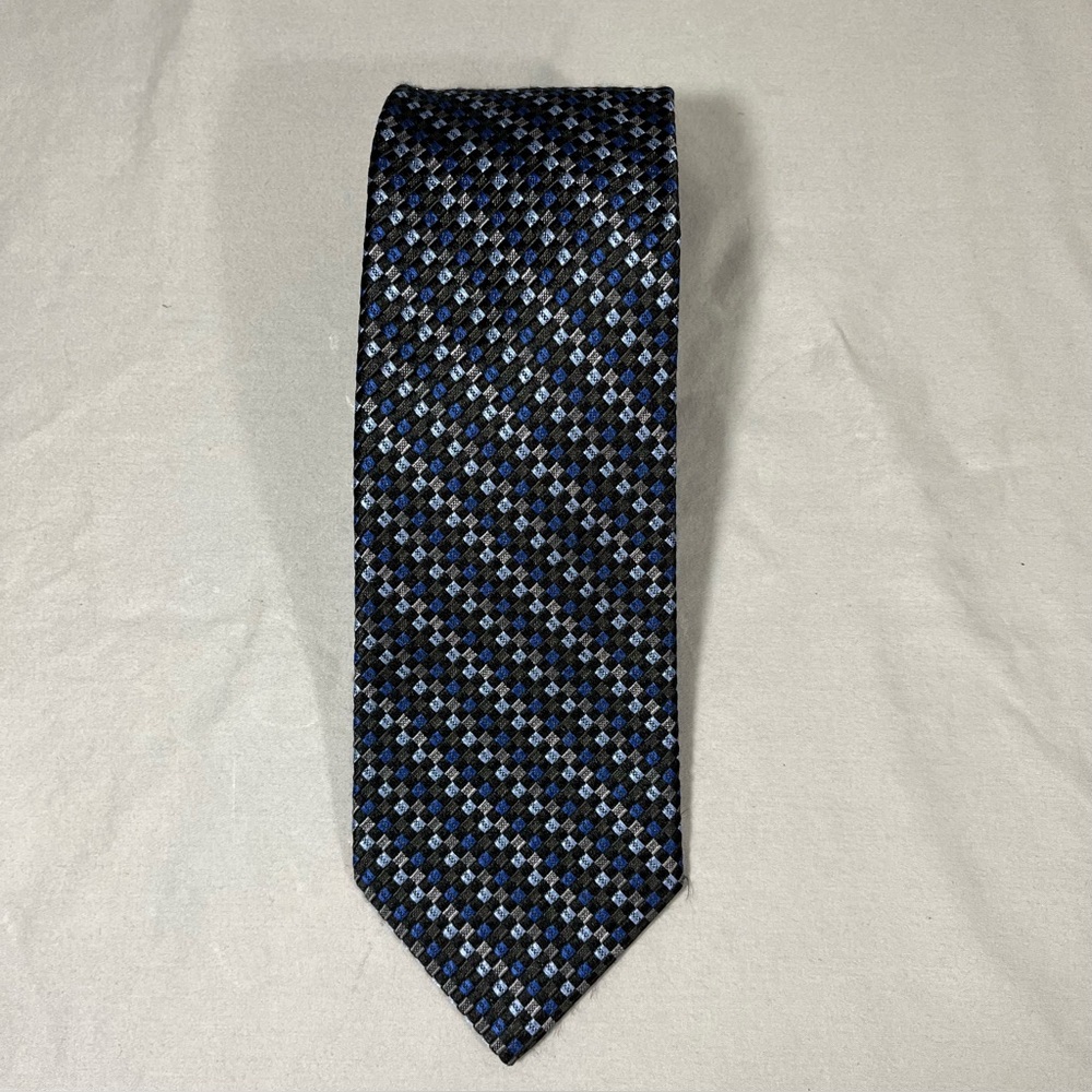 Bruno Piattelli men’s neck tie. 100% silk. Blue, black, and. Gray pattern.